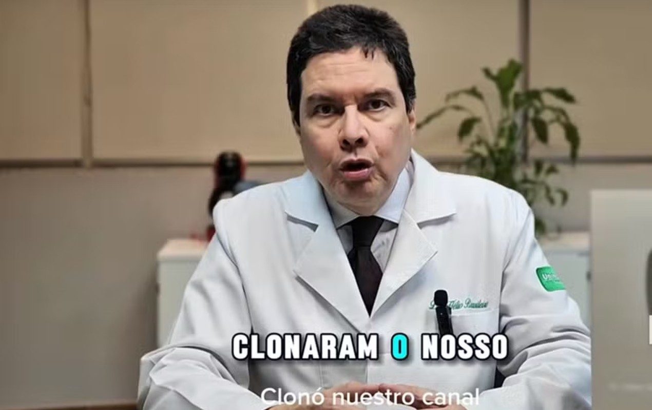 O médico Hélio Brasileiro reclama em seu canal sobre clones que usam sua imagem; BBC News Brasil mapeou ao menos cinco páginas do tipo — Foto: Reprodução